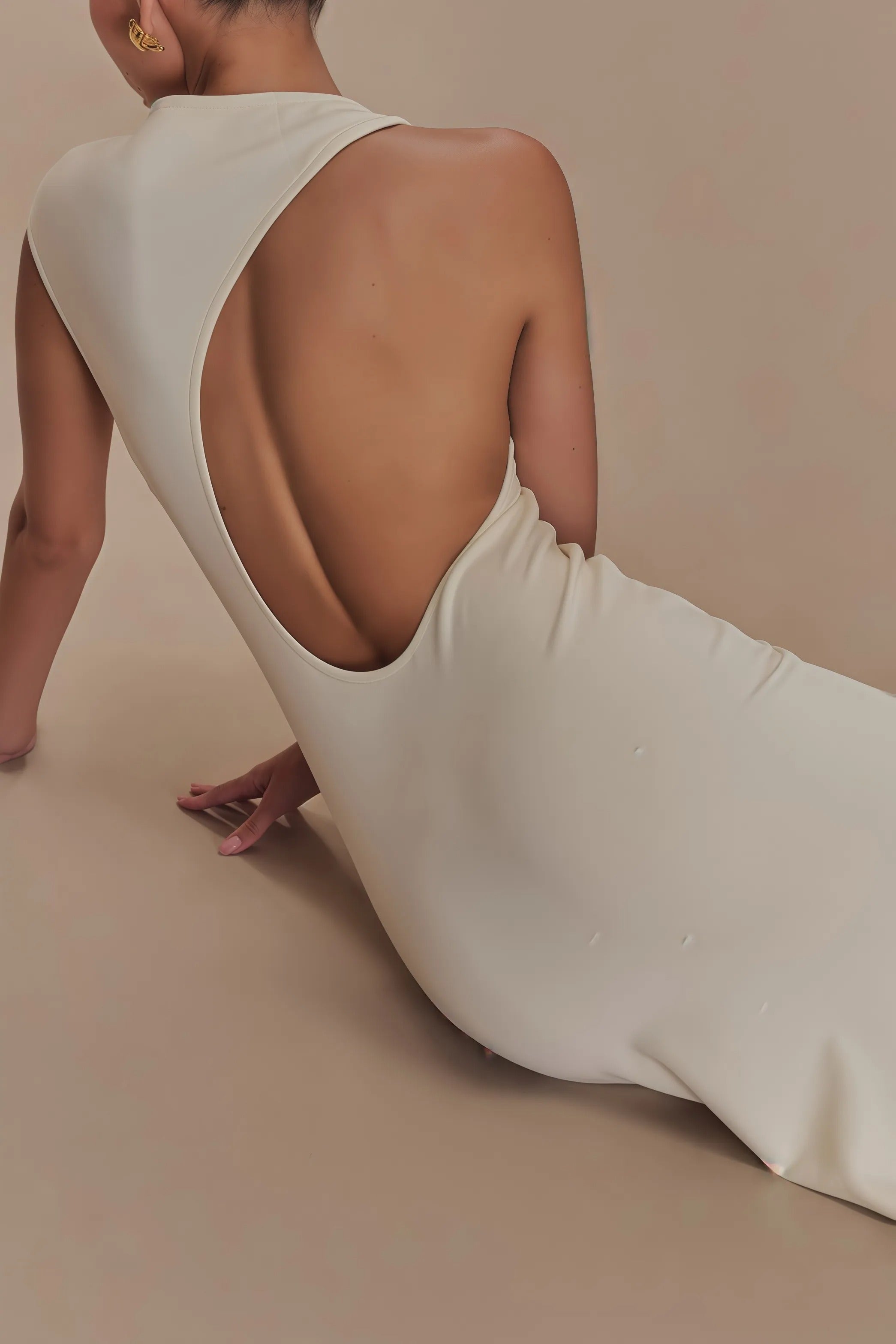 Beige mouwloze maxi-jurk