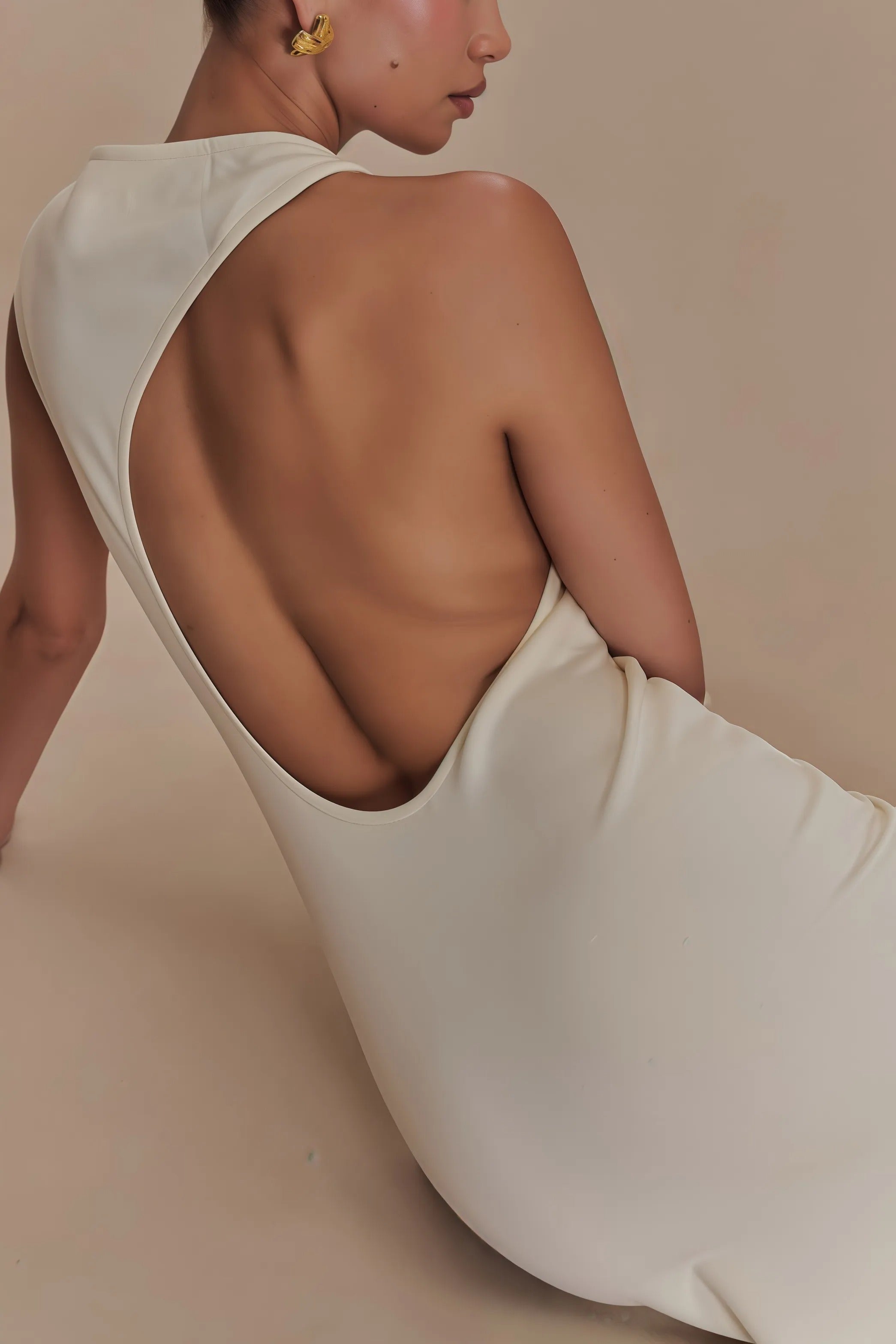 Beige mouwloze maxi-jurk