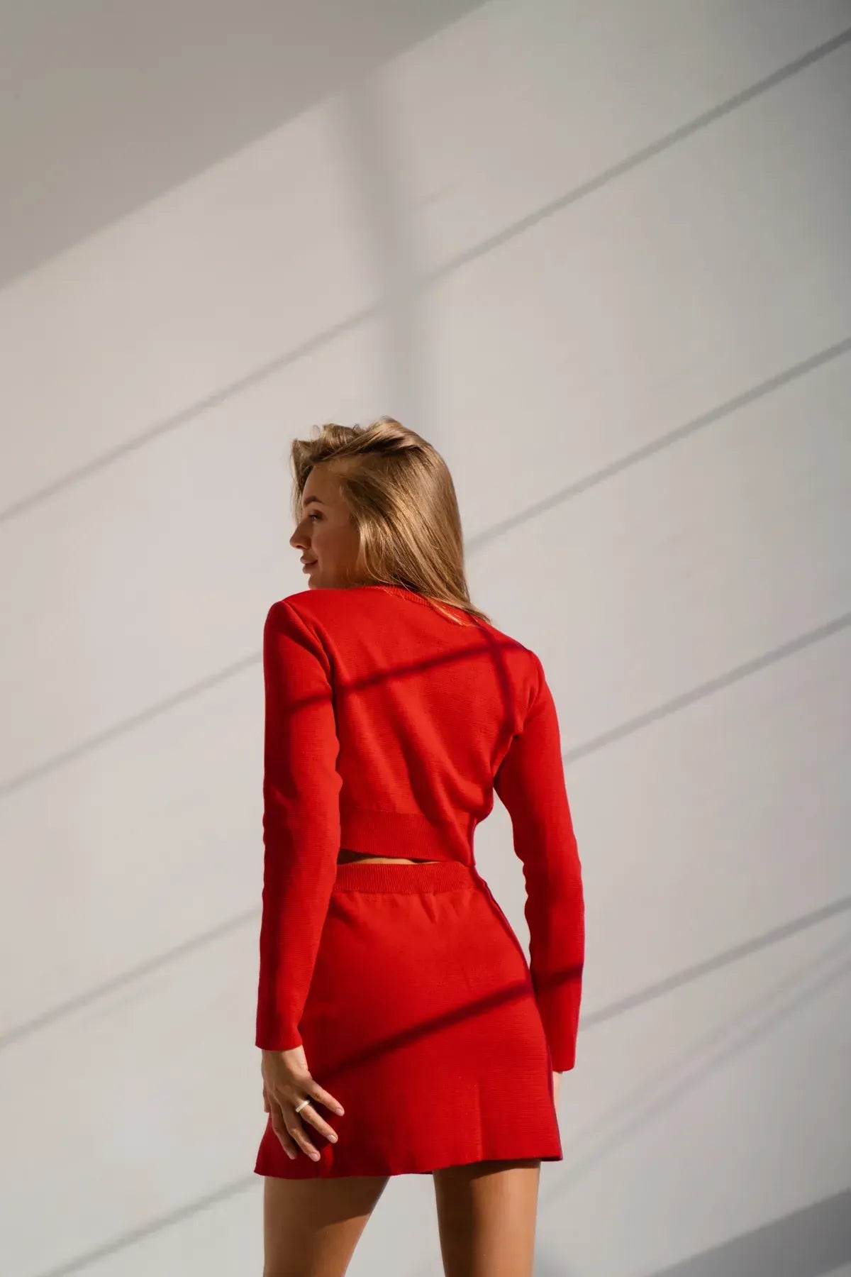 Rode gebreide set met crop top en rok