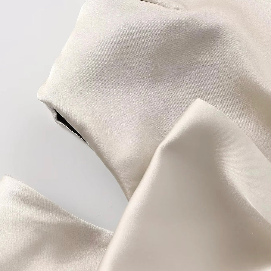 Champagnefärgad topp med band i midjan