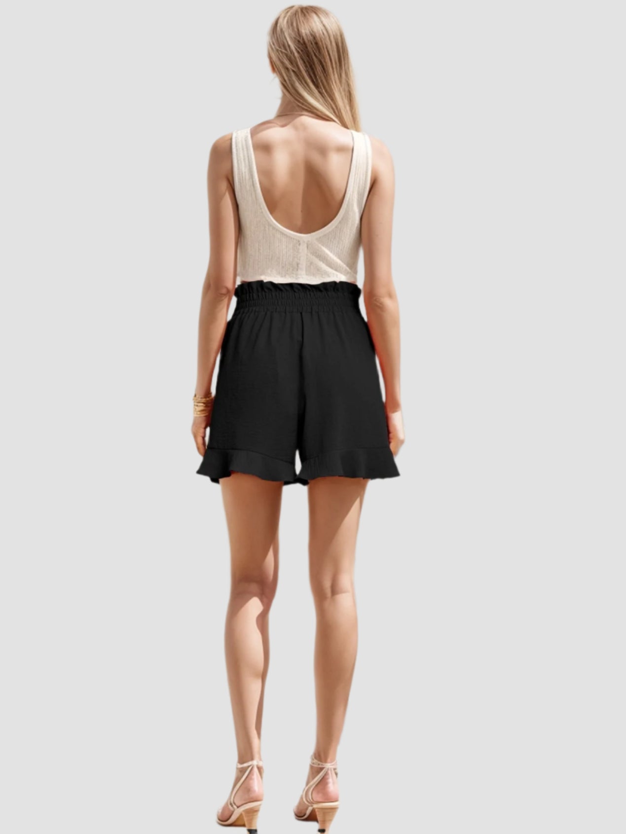 Geplooide shorts met strikceintuur