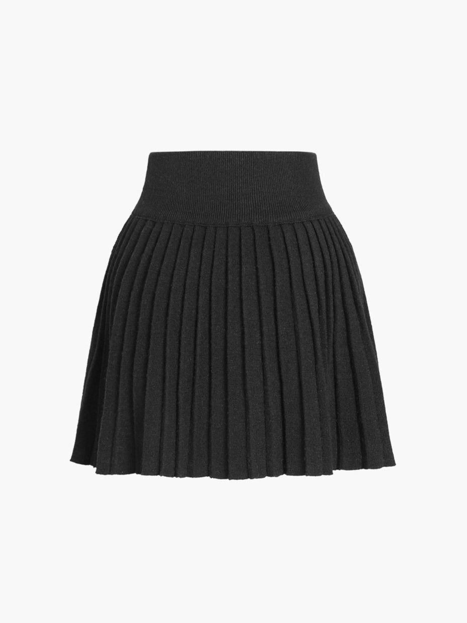 Set van geribbeld vest en geplooide rok