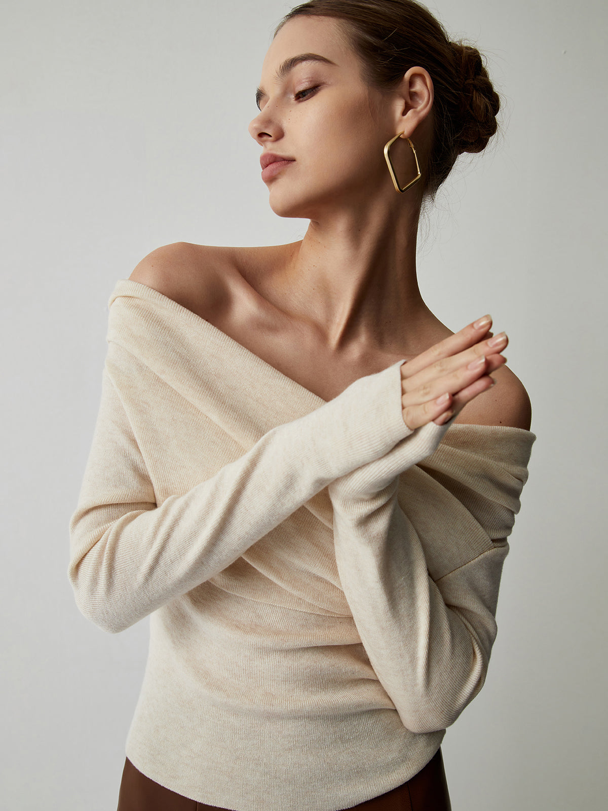 Gedrapeerde off-shoulder top met lange mouwen
