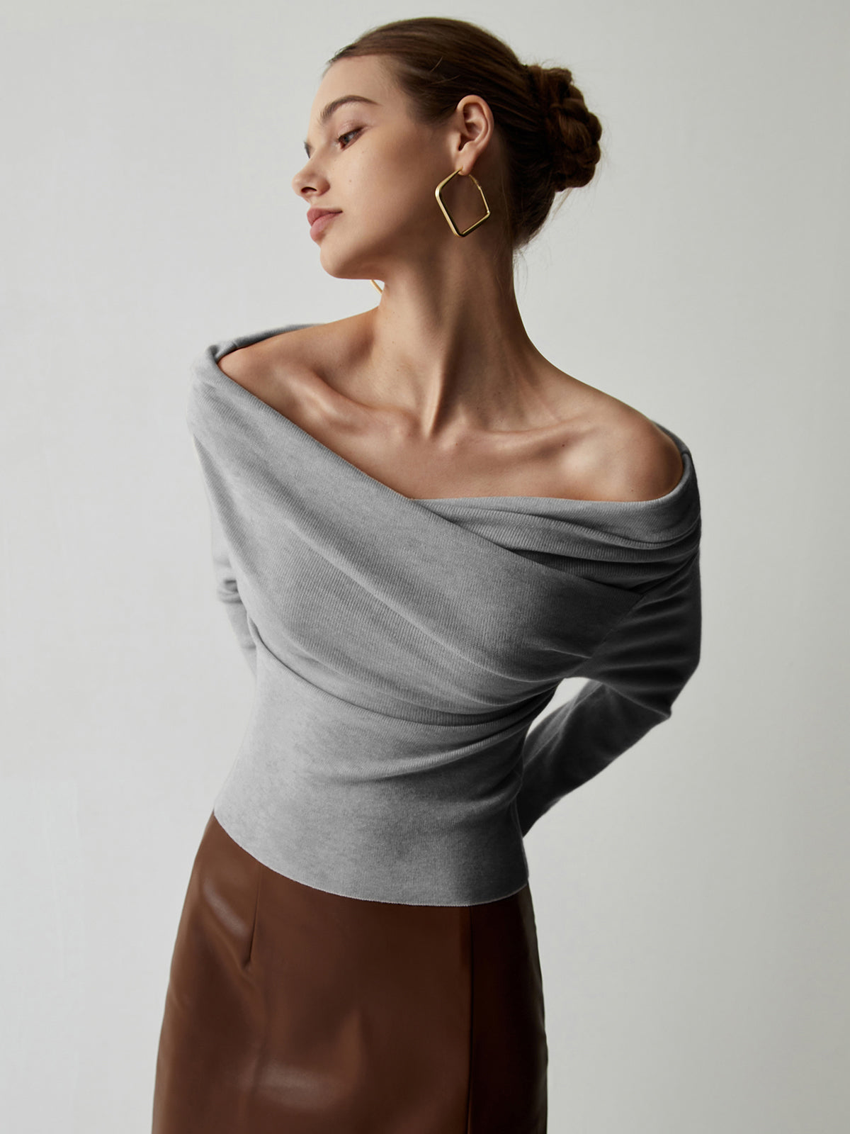 Gedrapeerde off-shoulder top met lange mouwen