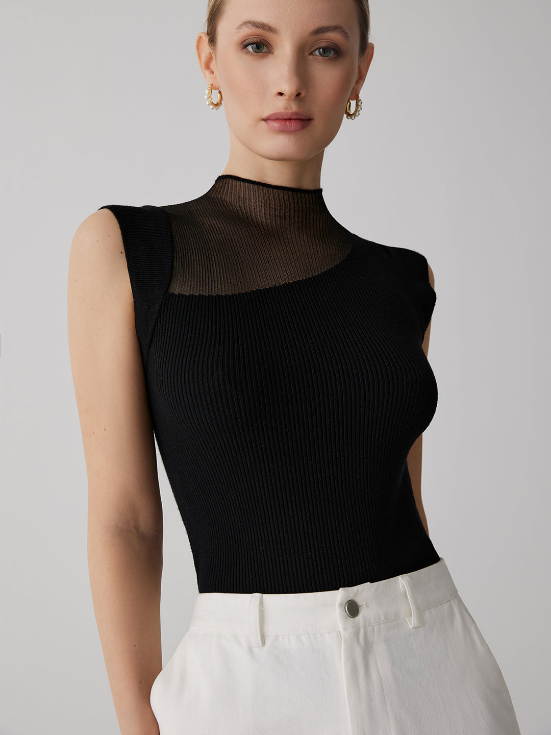 Mouwloos geribbeld topje met mesh detail