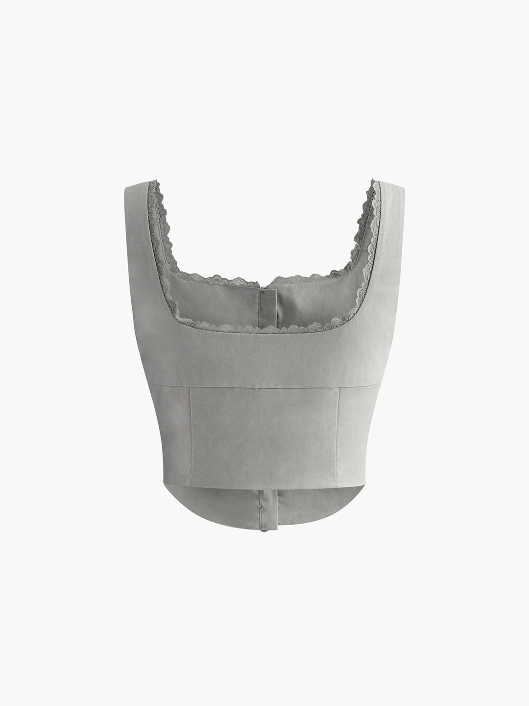 Witte korsettop met knoopdetails en kanten rand