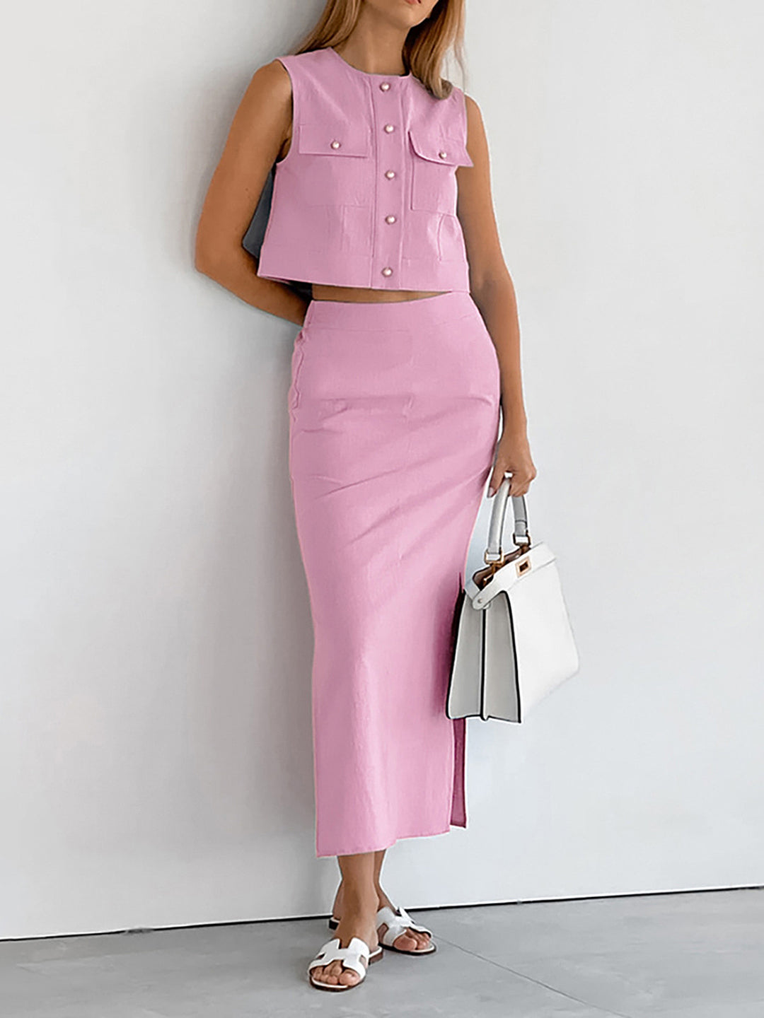 Mouwloze set met rok en top met split