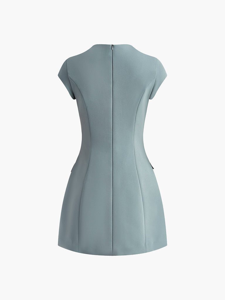 Elegante mini-jurk met zakdetails