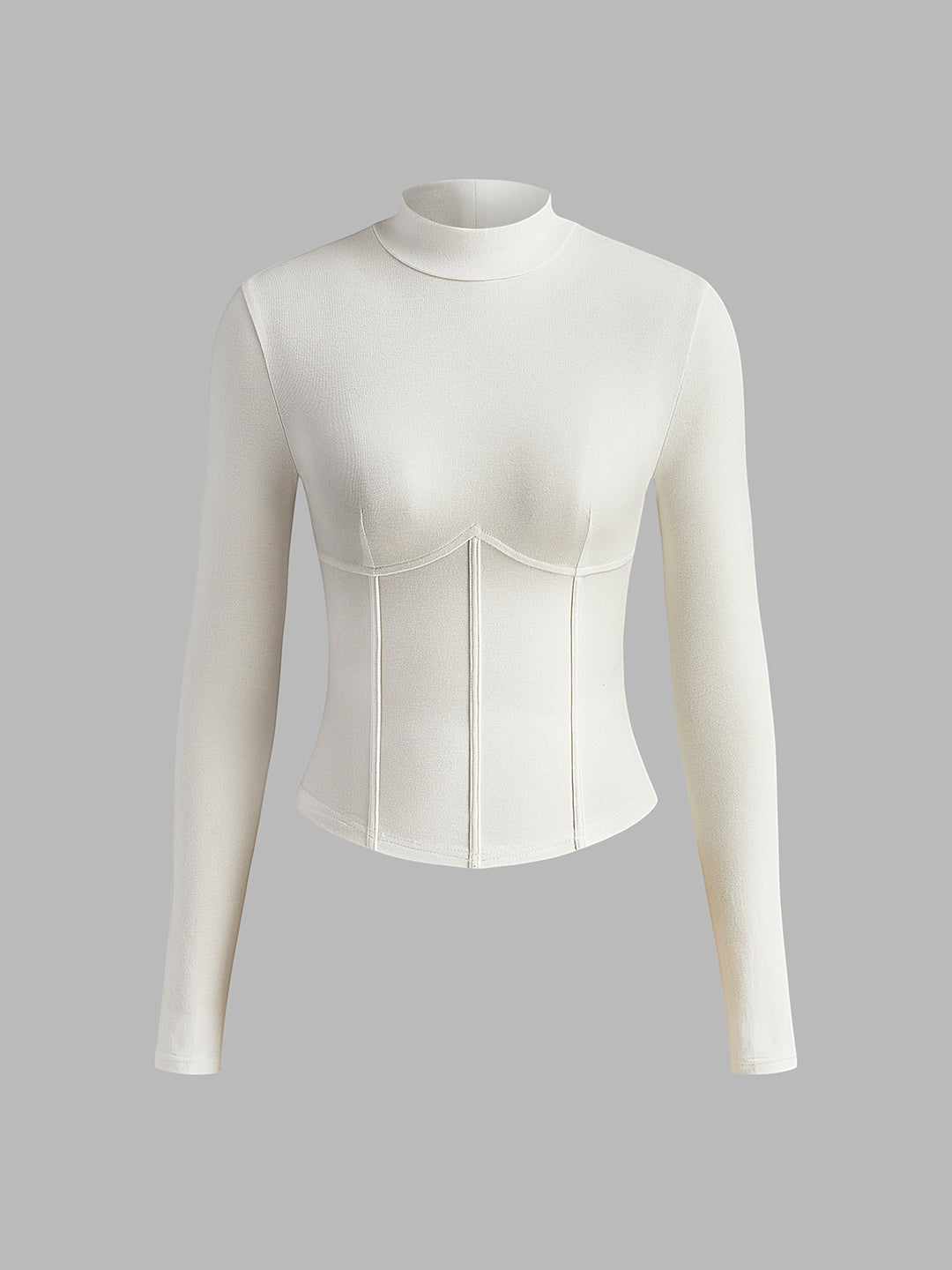 Witte getailleerde top met lange mouwen en korsetdetails