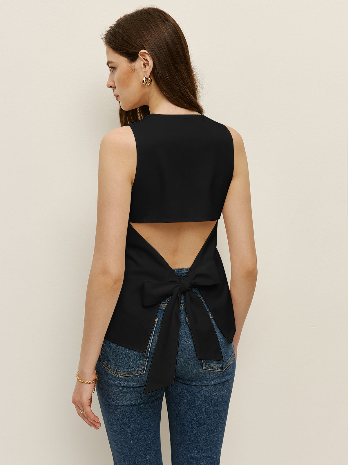 Mouwloos vest met knoopsluiting