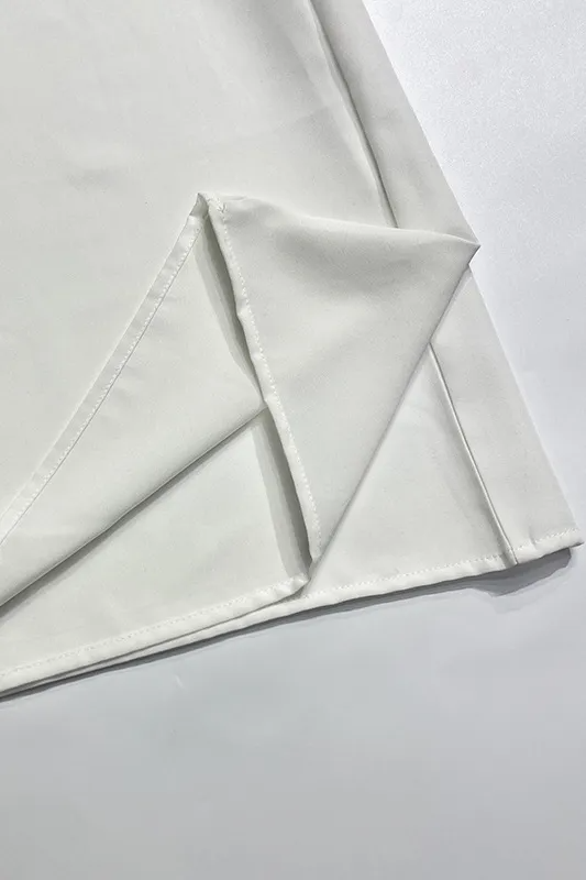Witte mouwloze halternek maxi-jurk
