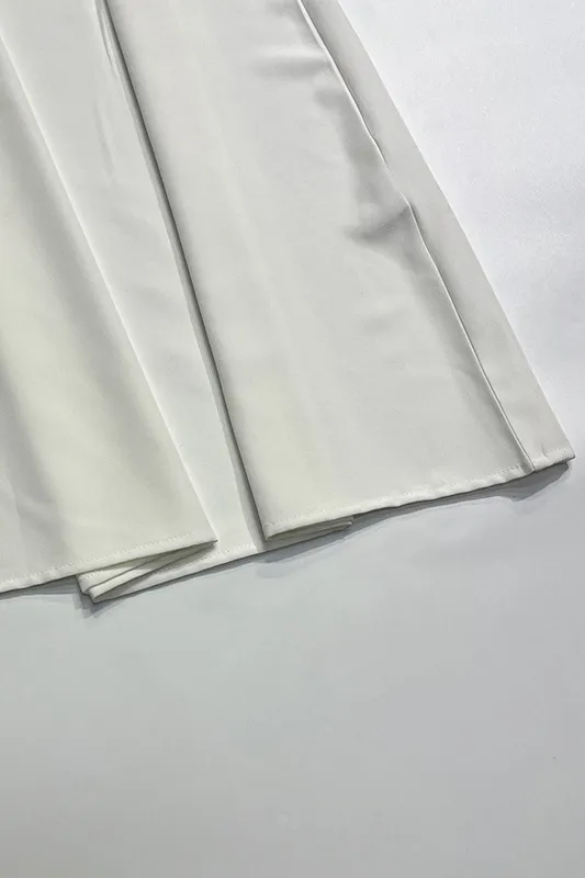 Witte mouwloze halternek maxi-jurk
