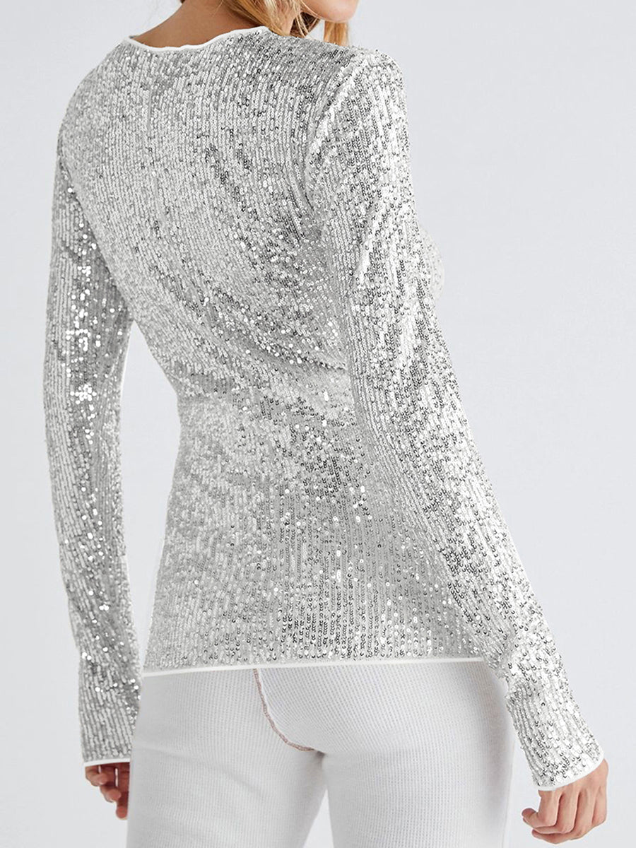 Glittrig långärmad skjorta med rund hals