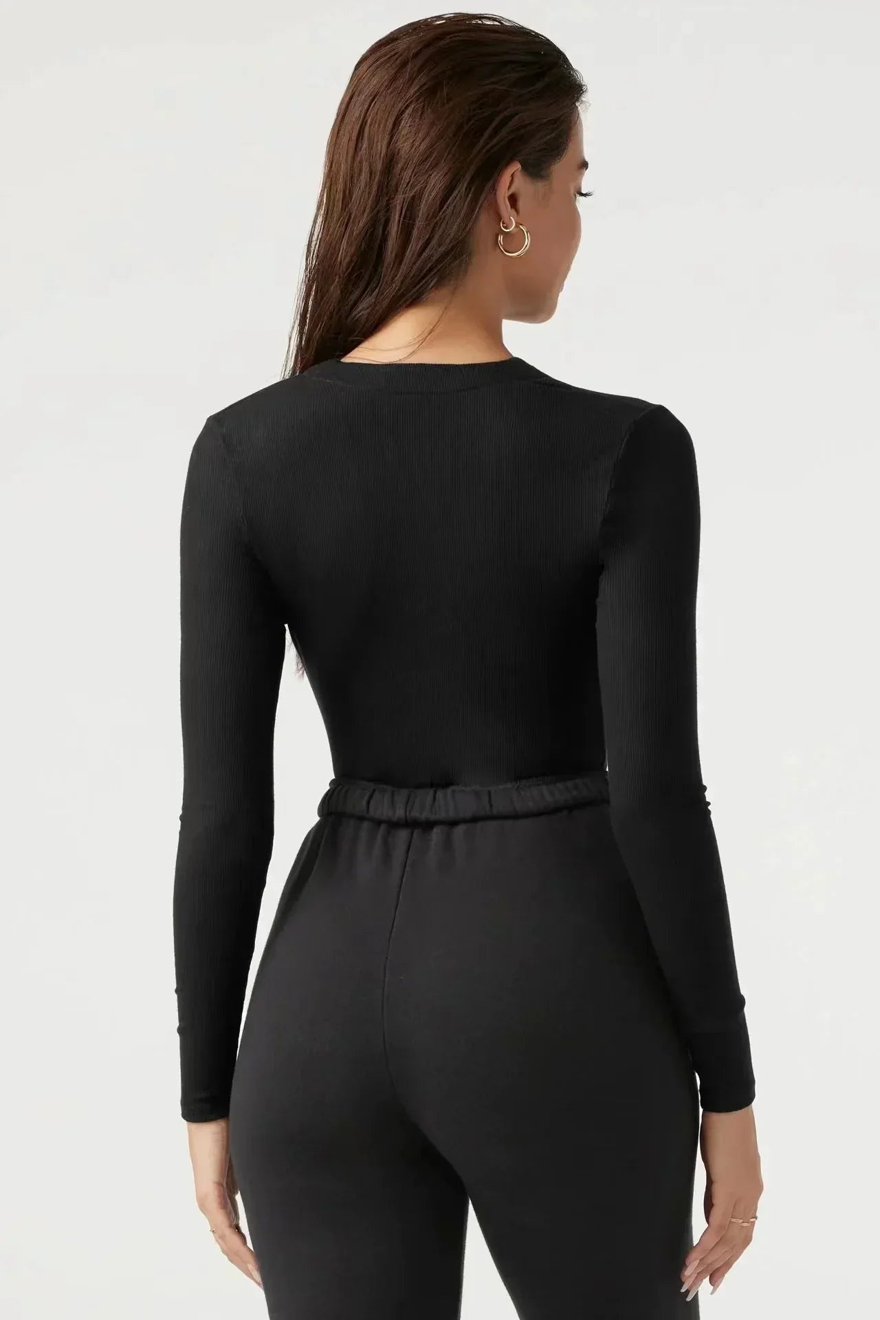 Bodysuit med dragkedja och långa ärmar