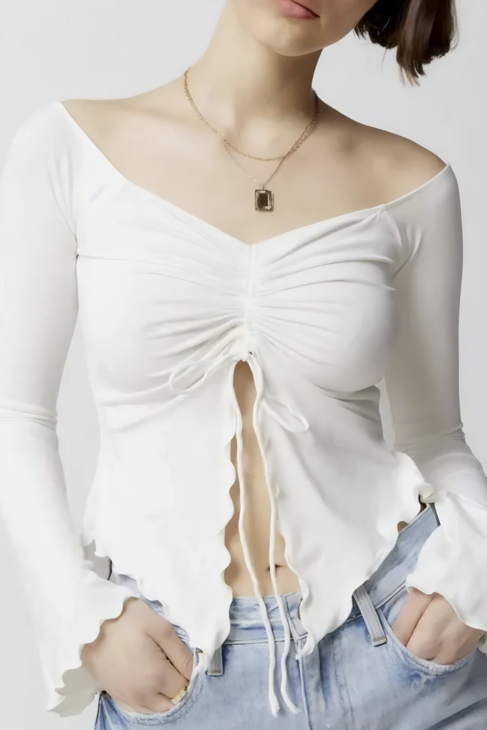 AMARA OFF-SHOULDER TOP MET UITLOPENDE MOUWEN