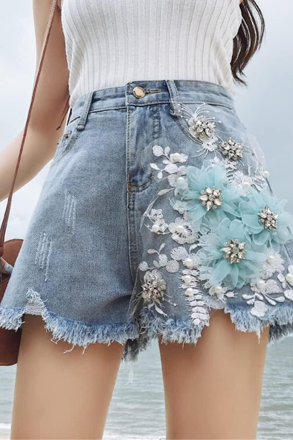 GEBORDUURDE DENIM SHORTS