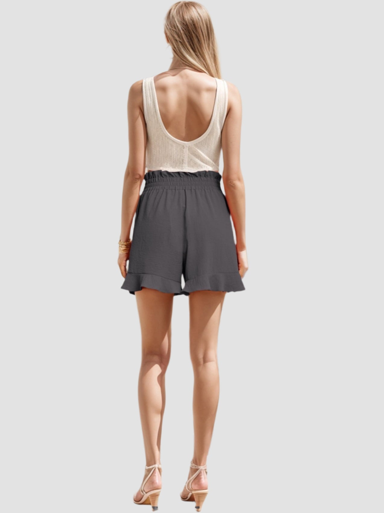 Geplooide shorts met strikceintuur