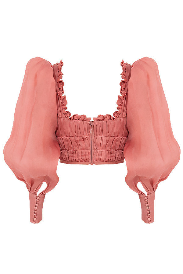 Rouge långärmad korsett med volanger
