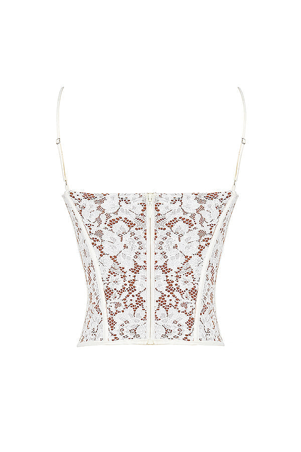 Korsett med spets och karamellfärgade byxor