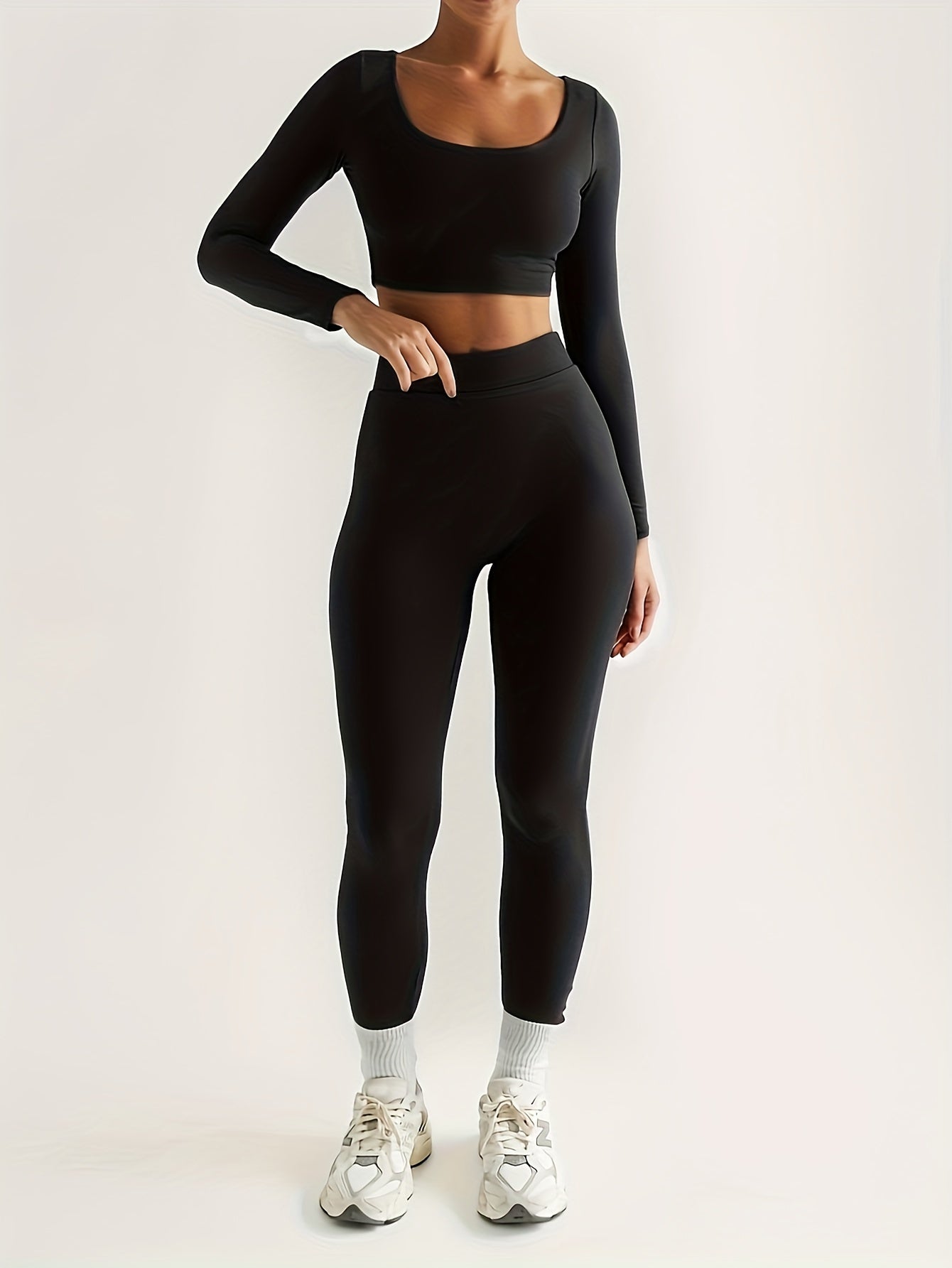 Trainingspakset met lange mouwen, top en legging