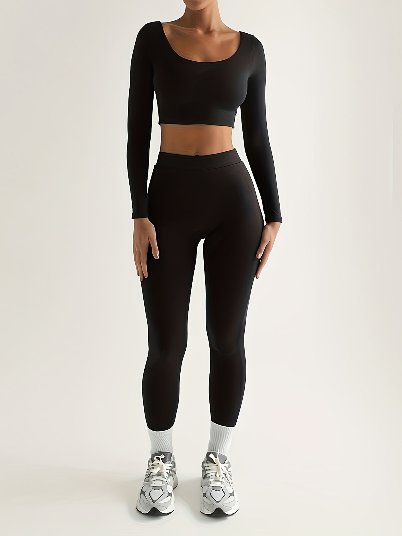 Trainingspakset met lange mouwen, top en legging