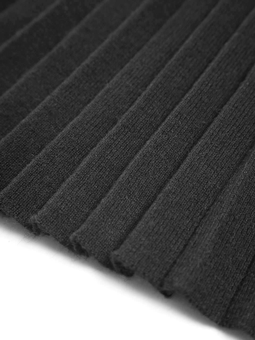 Set van geribbeld vest en geplooide rok