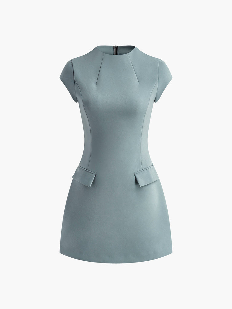 Elegante mini-jurk met zakdetails
