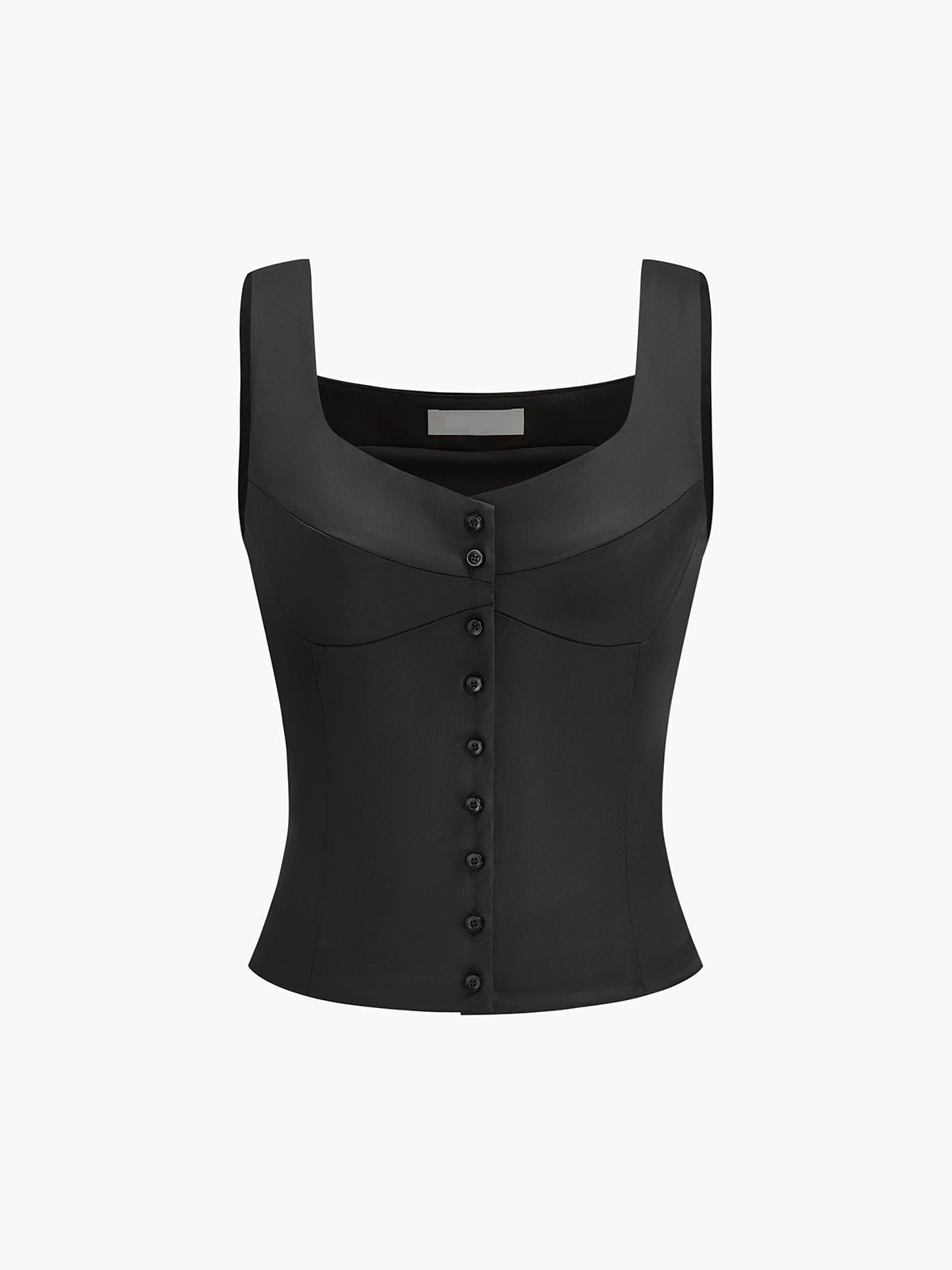 Gevormde top met knoopdetails
