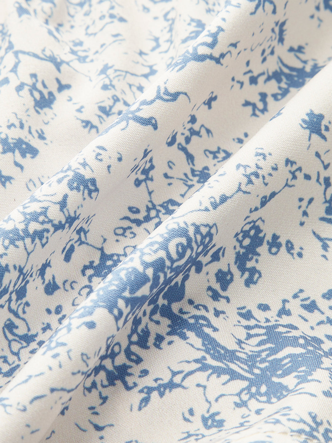 Zomertop met bloemenprint en kanten details