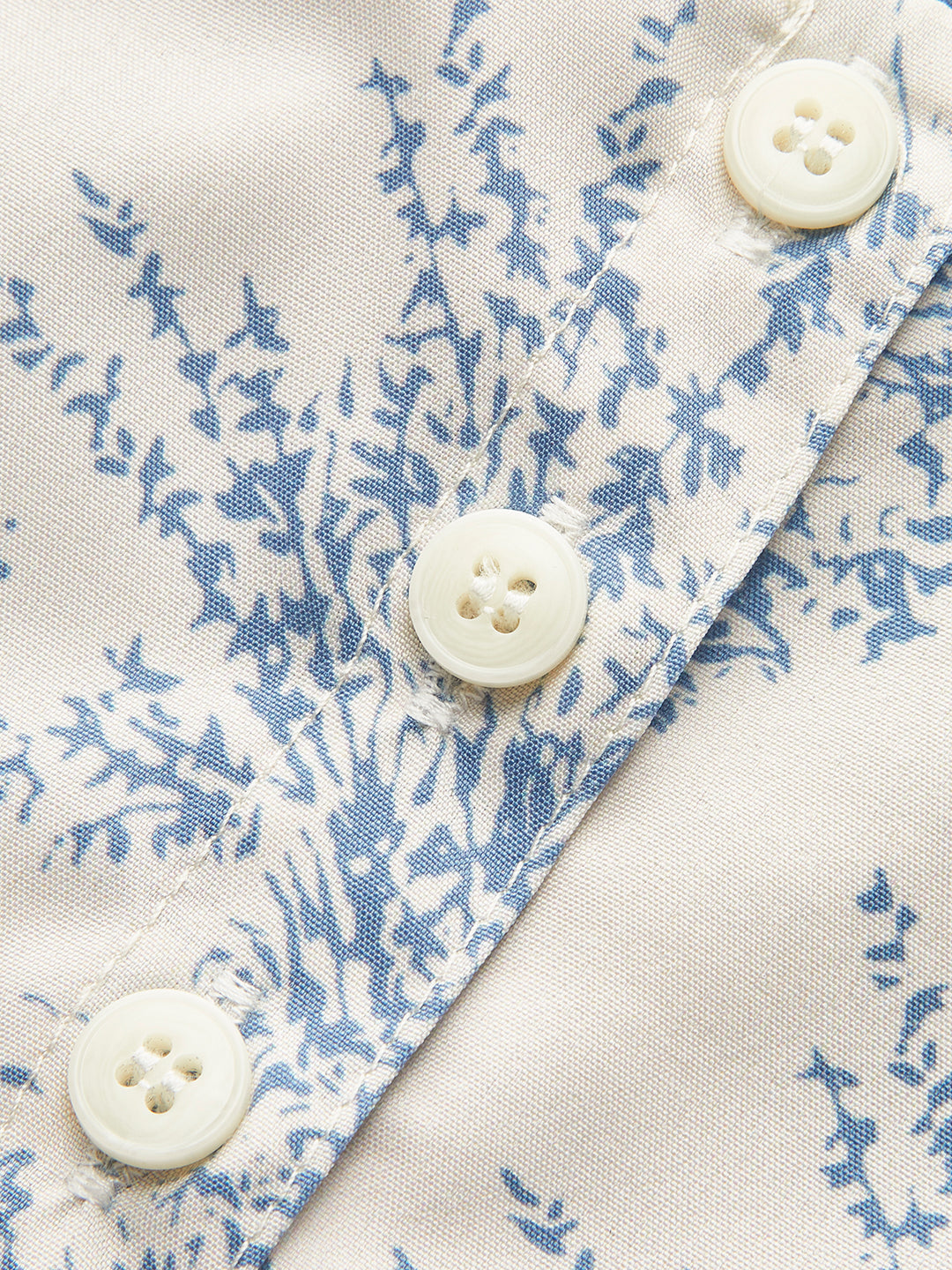 Zomertop met bloemenprint en kanten details