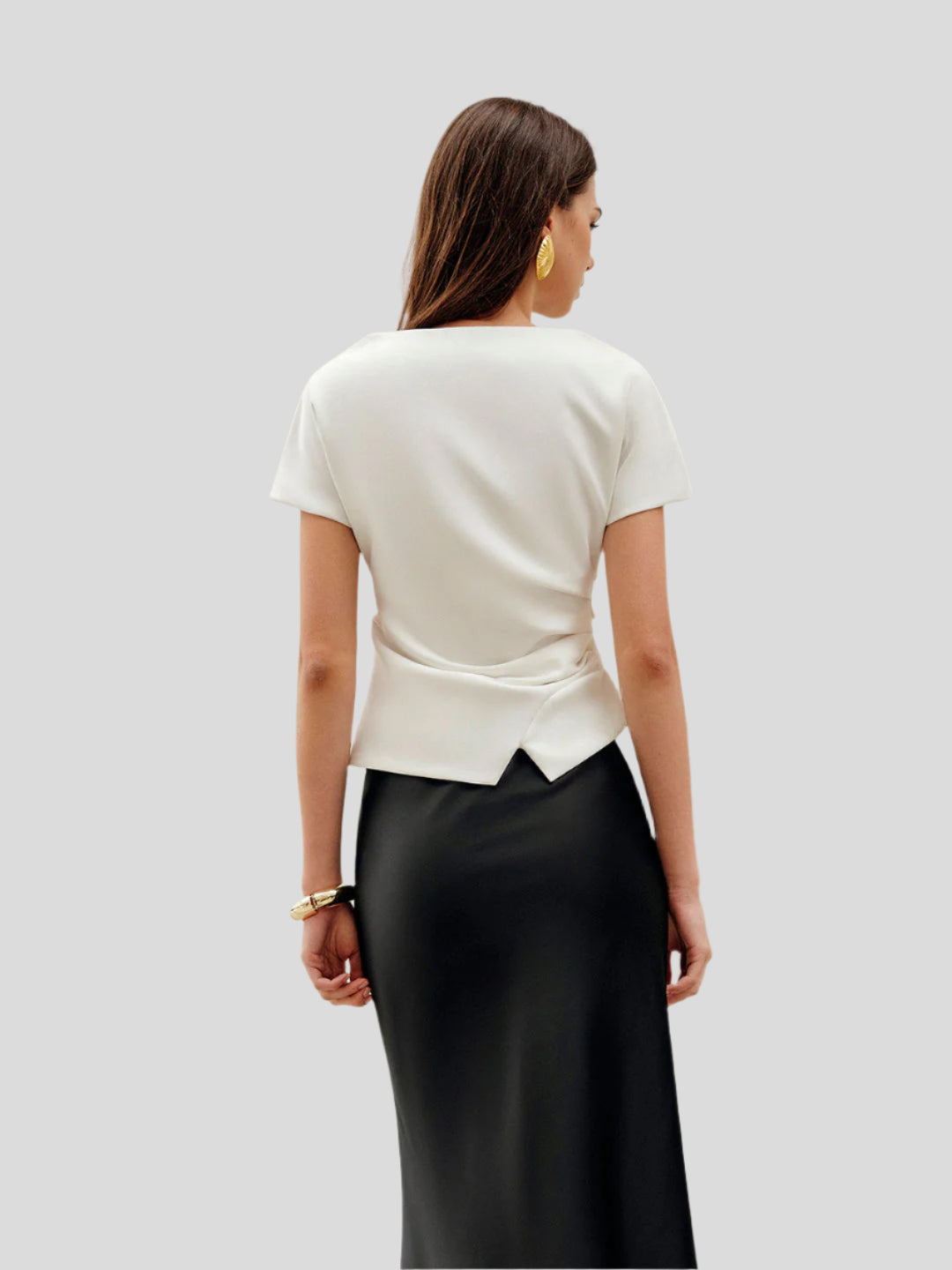 Gedrapeerde top met asymmetrische zoom
