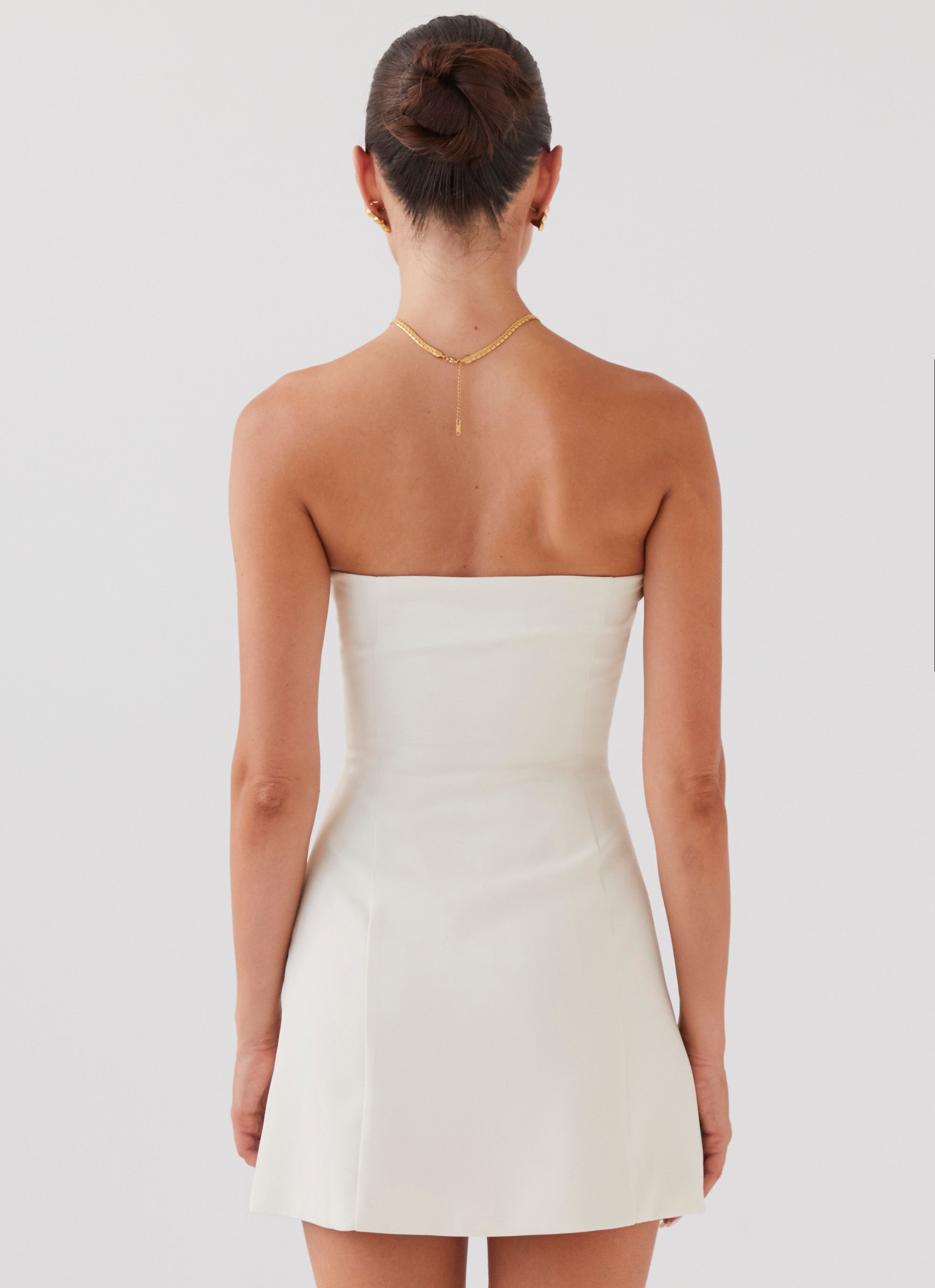 Witte strapless mini-jurk