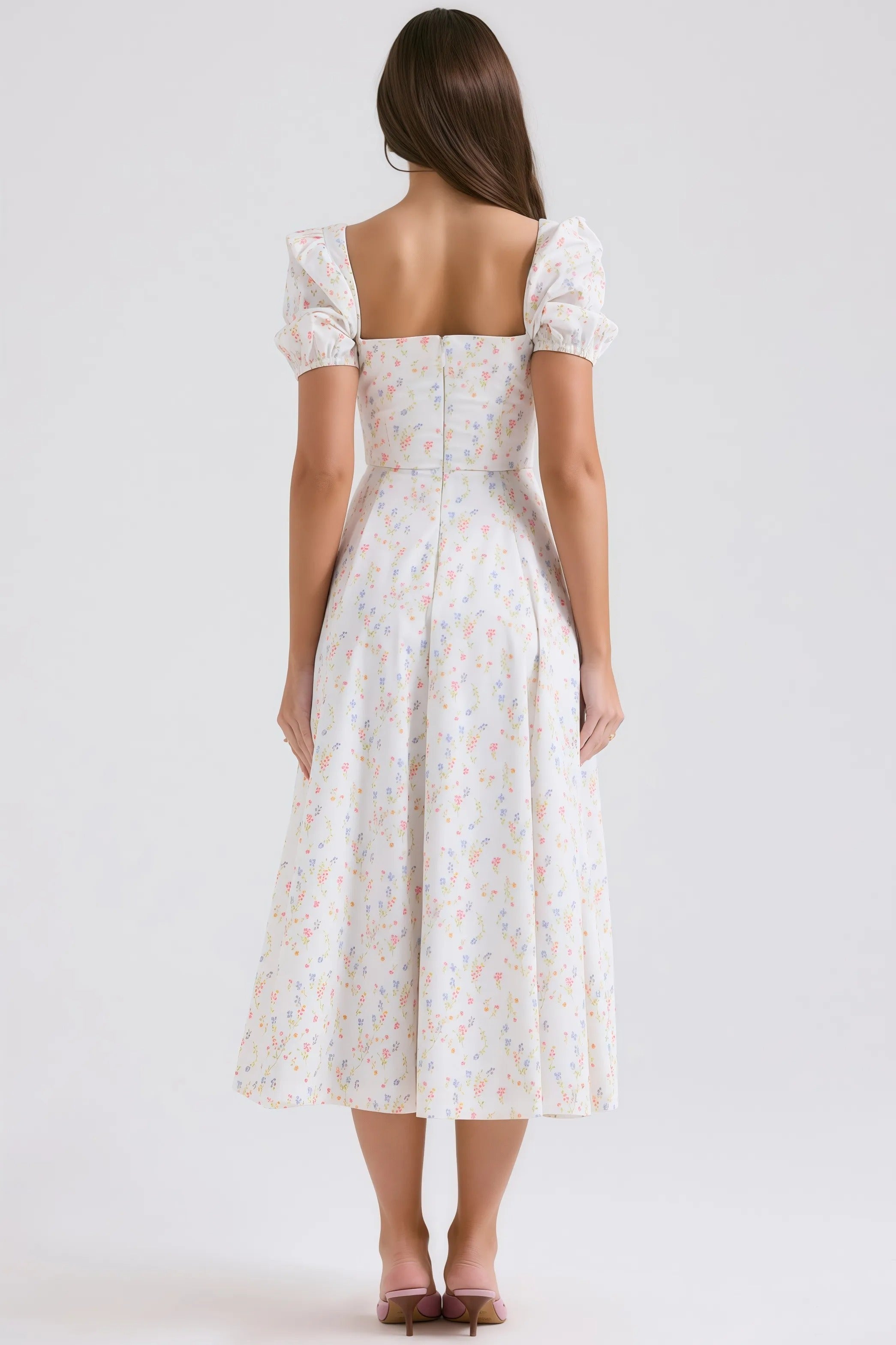 Witte midi-jurk met pastelkleurig bloemenpatroon en pofmouwen